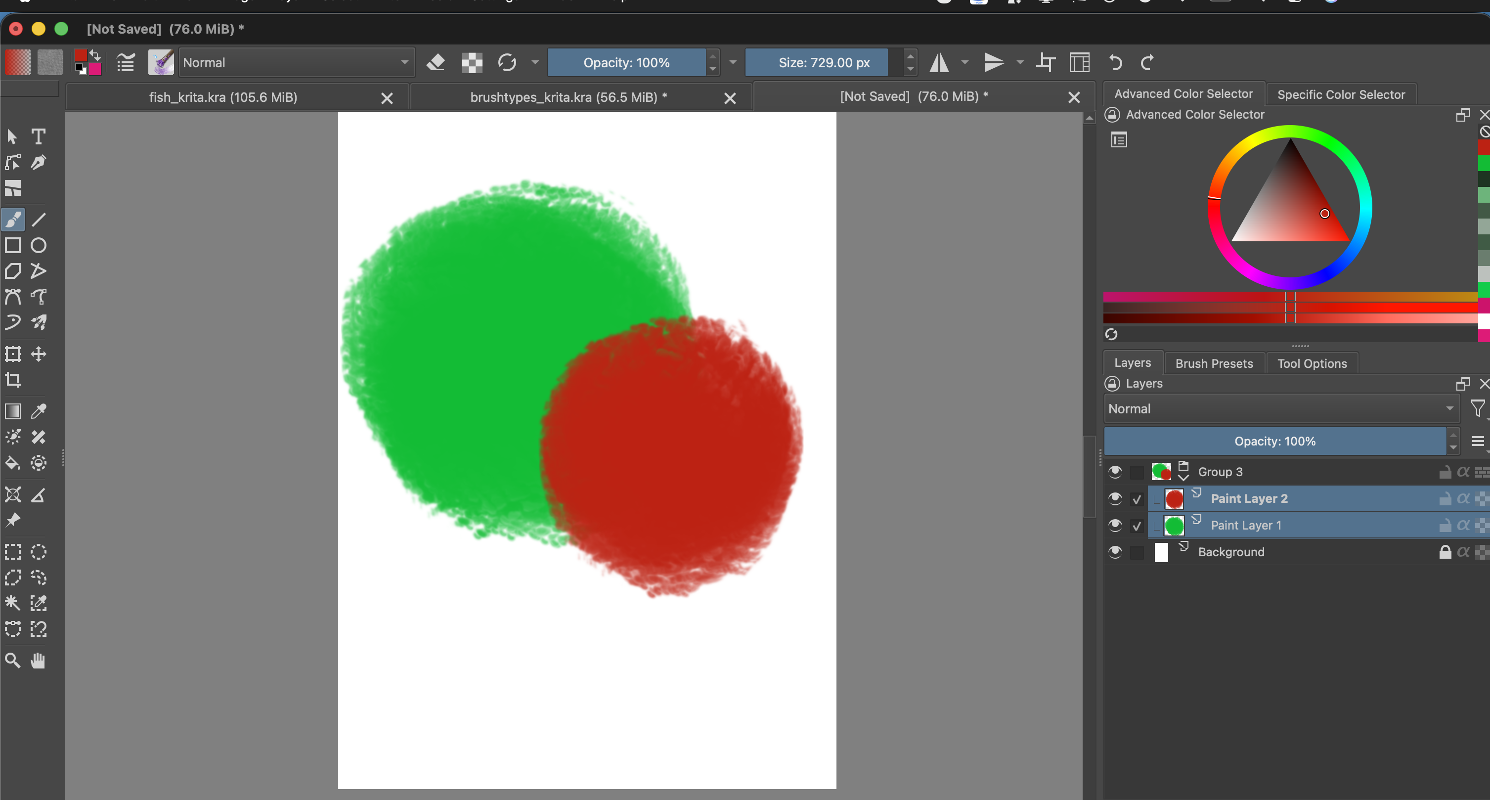 The Layers docker now shows Group 3 containing the red Paint Layer 2 above the green Paint Layer 1. Both circles still appear as separate overlapping shapes on the canvas.